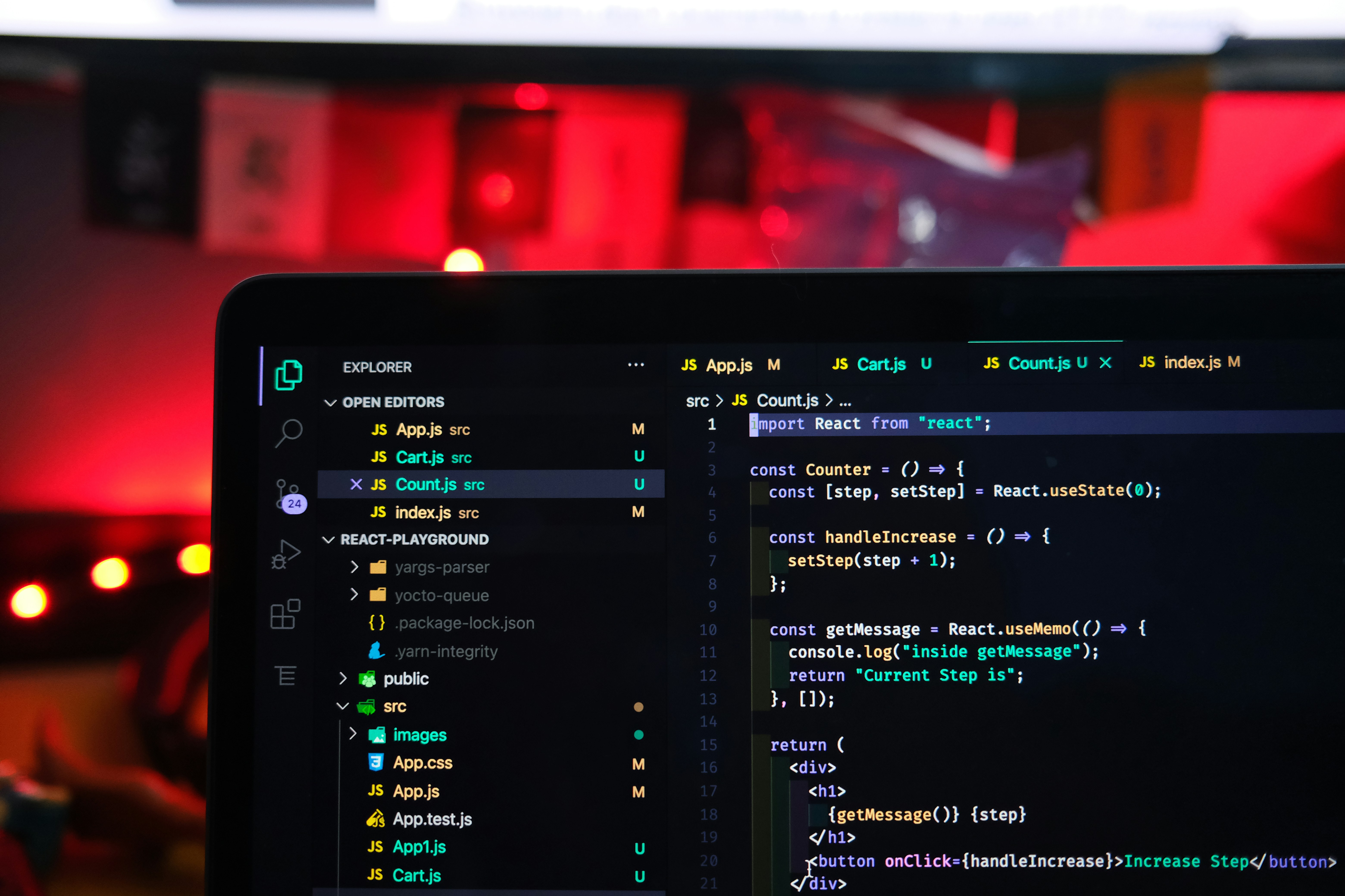 Code editor showing a React counter app.