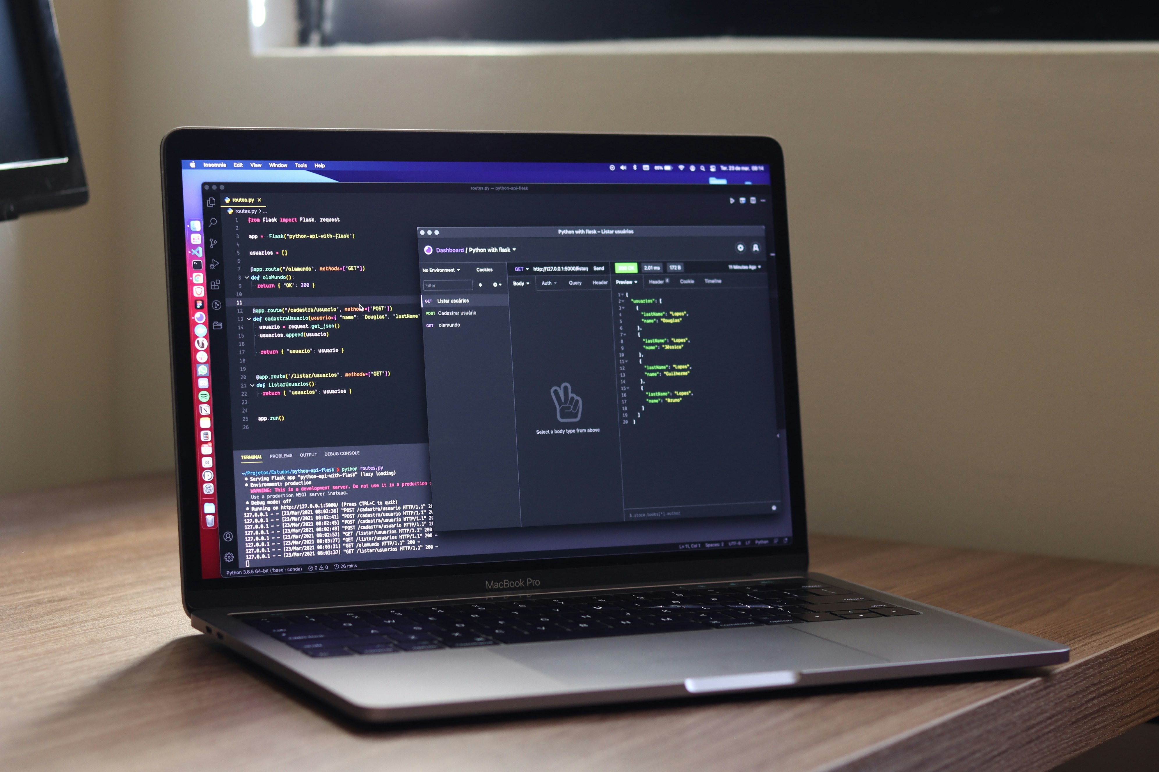 Laptop displaying Python code and API testing tool
