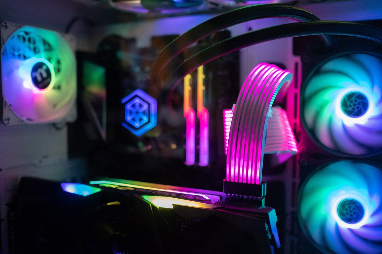Gamer plugging in a gigabit Ethernet cable to demonstrate how to optimize gaming PC for low latency network performance.