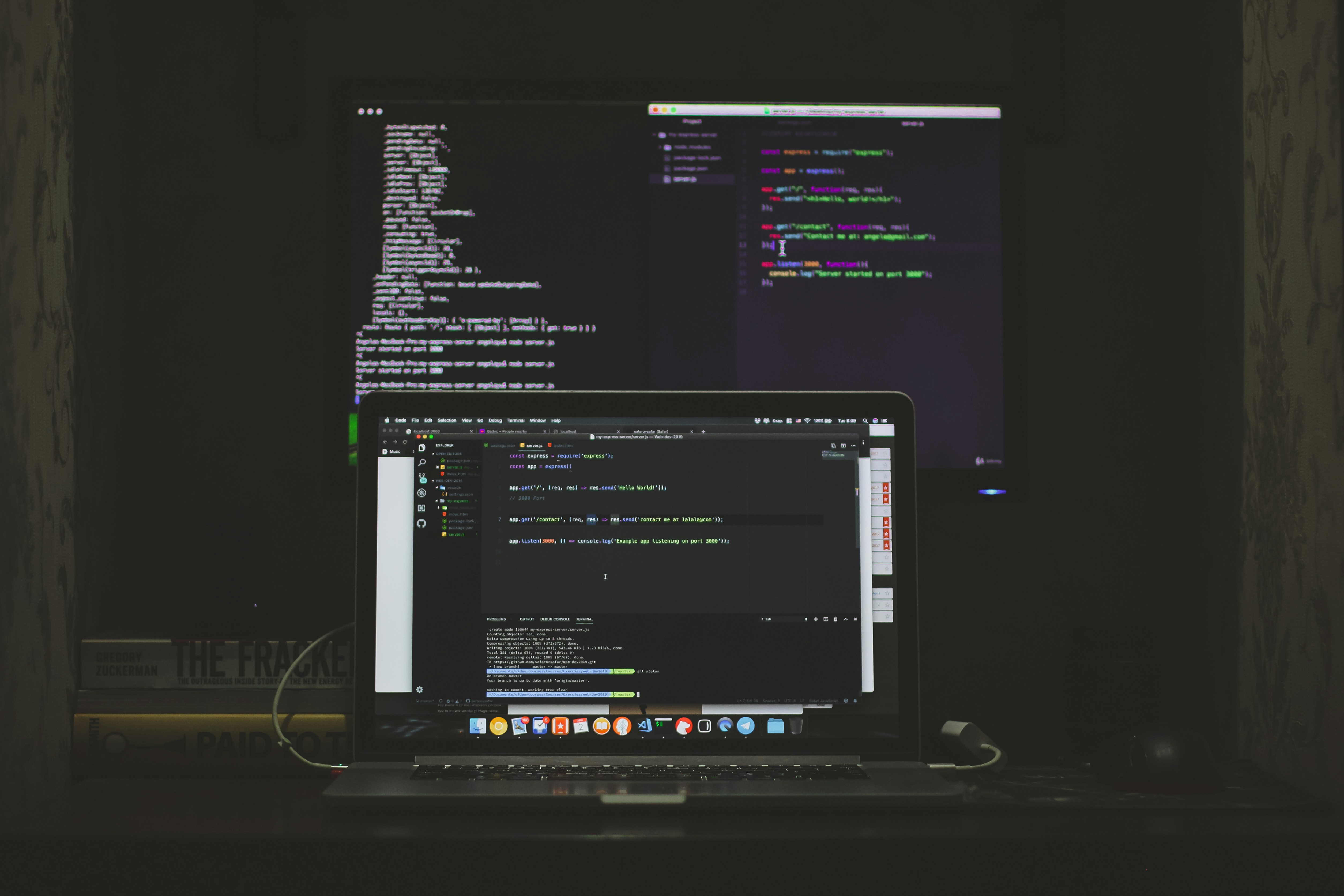 Laptop with dark-themed code editor