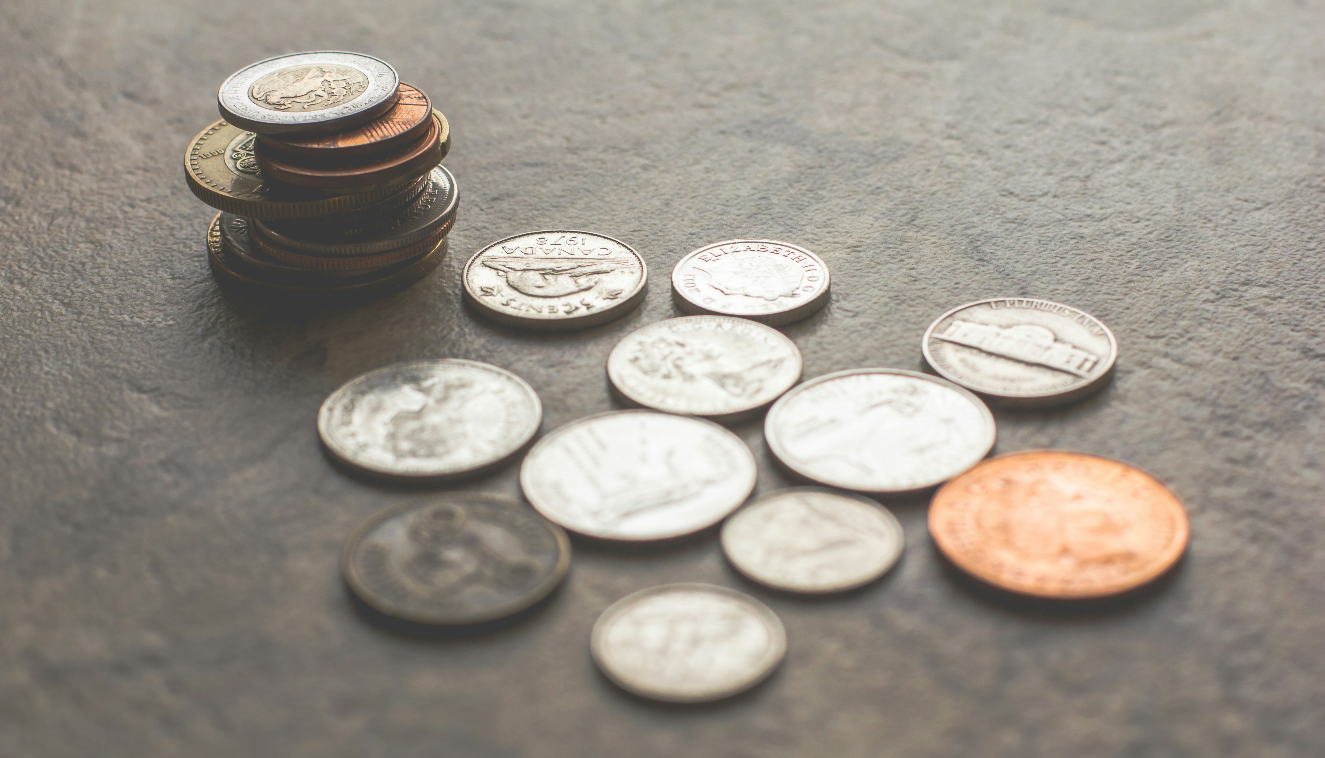 Coins on grey surface